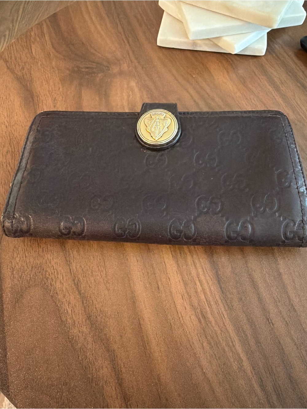 Gucci Dark Brown Embossed GG Leather Wallet with Gold Crest